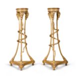 A pair of George III carved giltwood torch&#232;res, circa 1770s, attributed to Mayhew and Ince