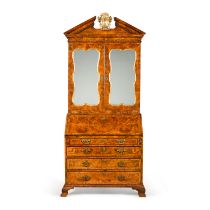 An George II walnut and parcel-gilt bureau cabinet, attributed to Giles Grendey, circa 1740