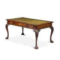 A George II carved mahogany double-sided library writing table, mid-18th century