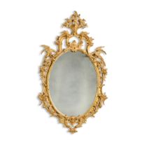 An early George III carved giltwood oval mirror, circa 1765