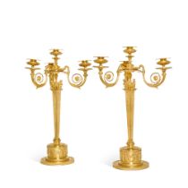 A pair of gilt-bronze four-light candelabra, probably Northern European, early 19th century