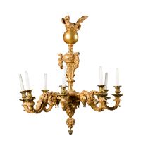 A Queen Anne carved giltwood and gilt-metal eight-light chandelier, circa 1710-15