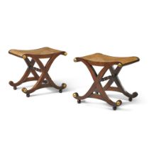 A pair of Regency style mahogany and parcel-gilt stools, modern