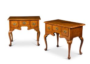 A pair of George II walnut lowboys, circa 1735