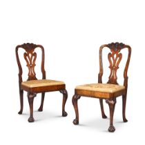 A pair of George II carved walnut side chairs, circa 1740, in the manner of Giles Grendey