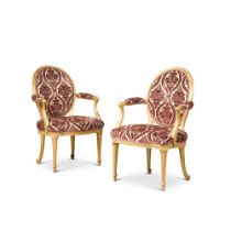 A pair of George III carved giltwood armchairs, circa 1775, attributed to Thomas Chippendale