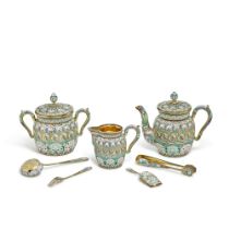 A seven-piece silver-gilt and cloisonn&#233; enamel tea service, Ovchinnikov, Moscow, 1899-1908