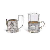 A nielloed silver tea glass holder and a trompe l'oeil silver tea glass holder, maker's marks Cyrill