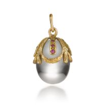 A Faberg&#233; jewelled varicoloured gold and rock crystal egg pendant, workmaster Michael Perkhin,