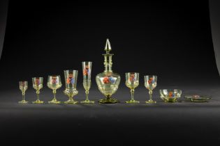 A Brown-Green Armorial Glass Table Service, Germany or Bohemia, late 19th century | Service de verre