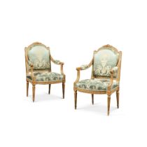 A pair of Louis XVI giltwood armchairs, circa 1780, stamped by Claude Javoy | Paire de fauteuils en