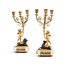 A pair of Louis XVI three-light gilt and patinated bronze candelabra, late 19th century | Paire de c