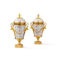 A pair of Louis XVI gilt-bronze mounted S&#232;vres pot-pourri vases with covers, circa 1780 | Paire