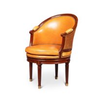 A Louis XVI style mahogany fauteuil de bureau tournant | Fauteuil de bureau tournant en acajou de st