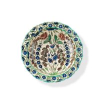 A French faience Iznik style deep dish, Damas serie, by Edmond Lachenal, circa 1900 | Plat creux en