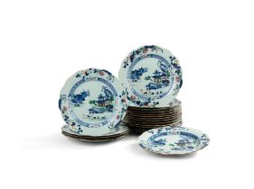 A set of eighteen blue and white and famille-rose &#8216;pagoda&#8217; lobed rim dishes, Qing dynast