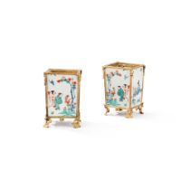 A pair gilt-bronze mounted porcelain kakiemon style flower pots, 19th century | Paire de cache-pots