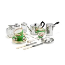 A silver and S&#232;vres porcelain tea set engraved MC for Marie-Caroline, Duchess of Berry, the sil