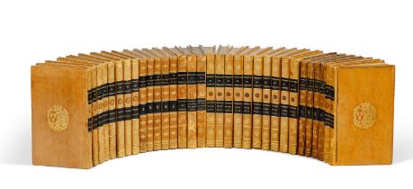 [Biblioth&#232;que d'une maison de campagne] 32 volumes. 1816-1822. Reliure homog&#232;ne aux armes