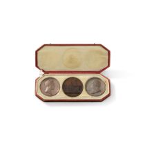 French, 19th century | France, XIXe si&#232;cle Three commemorative medals in a case bearing the coa