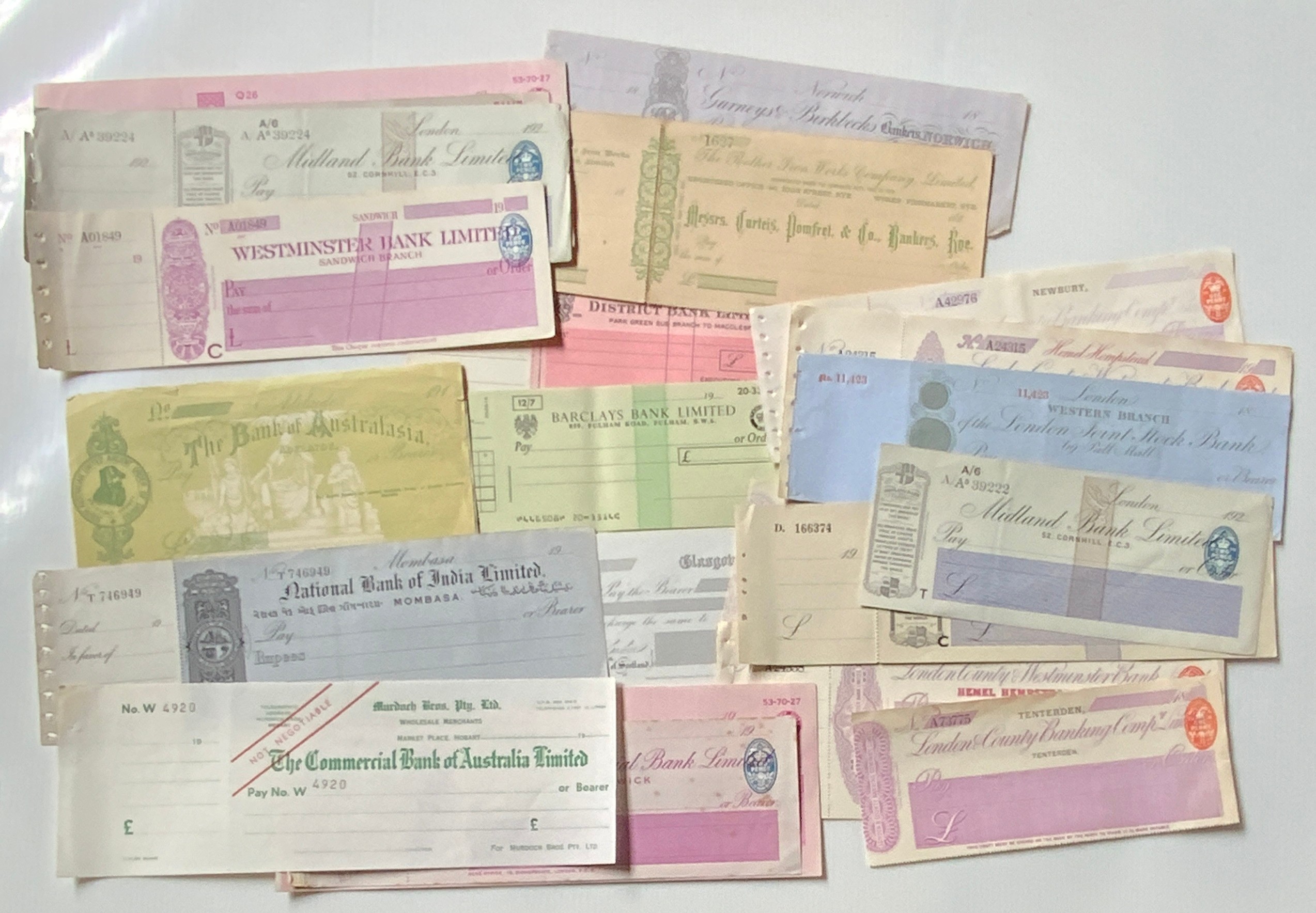 CHEQUES, BRITISH & WORLD BANKS (24). ALL UNISSUED