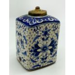 A BLUE AND WHITE FLORAL DECORATED DELFT FLASK A/F