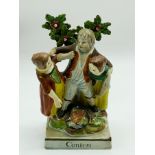 A STAFFORDSHIRE FIGURAL GROUP DEPICTING THREE FIGURES IN A STRUGGLE AGAINST A BOCAGE GROUND A/F