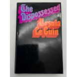 THE DISPOSSESSED BY URSULA LE GUIN PUBLISHED BY GOLLANCZ 1974 SIGNED & WITH INVITATION