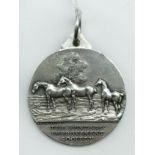 HALLMARKED SILVER MEDAL FOR THE HUNTER'S IMPROVEMENT SOCIETY 1907 BY FRANK HYAMS