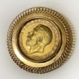1911 GOLD SOVEREIGN IN 9CT GOLD BROOCH - 14.3 GRAMS