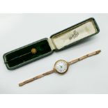 GOLD CASED WATCH & GOLD PIN