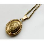 9CT GOLD LOCKET AND CHAIN