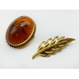 TWO 9CT GOLD BROOCHES - ONE WITH AMBER