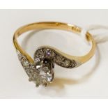 18CT GOLD PLATINUM MOUNTED RING, CENTRE STONE IS APPROX 0.30CTS SURROUNDED BY CLUSTERS TO THE