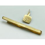 9CT GOLD PLATED MONEY CLIP & A 9CT GOLD CUFFLINK