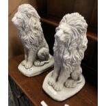 PAIR OF SMALL SEATED LIONS