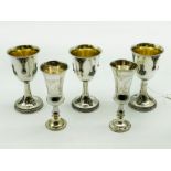 TWO SILVER KIDDISH CUPS WITH THREE OTHERS