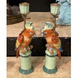 PAIR OF BRONZE & PORCELAIN RED PARROT CANDLESTICKS 28.5CMS (H) APPROX