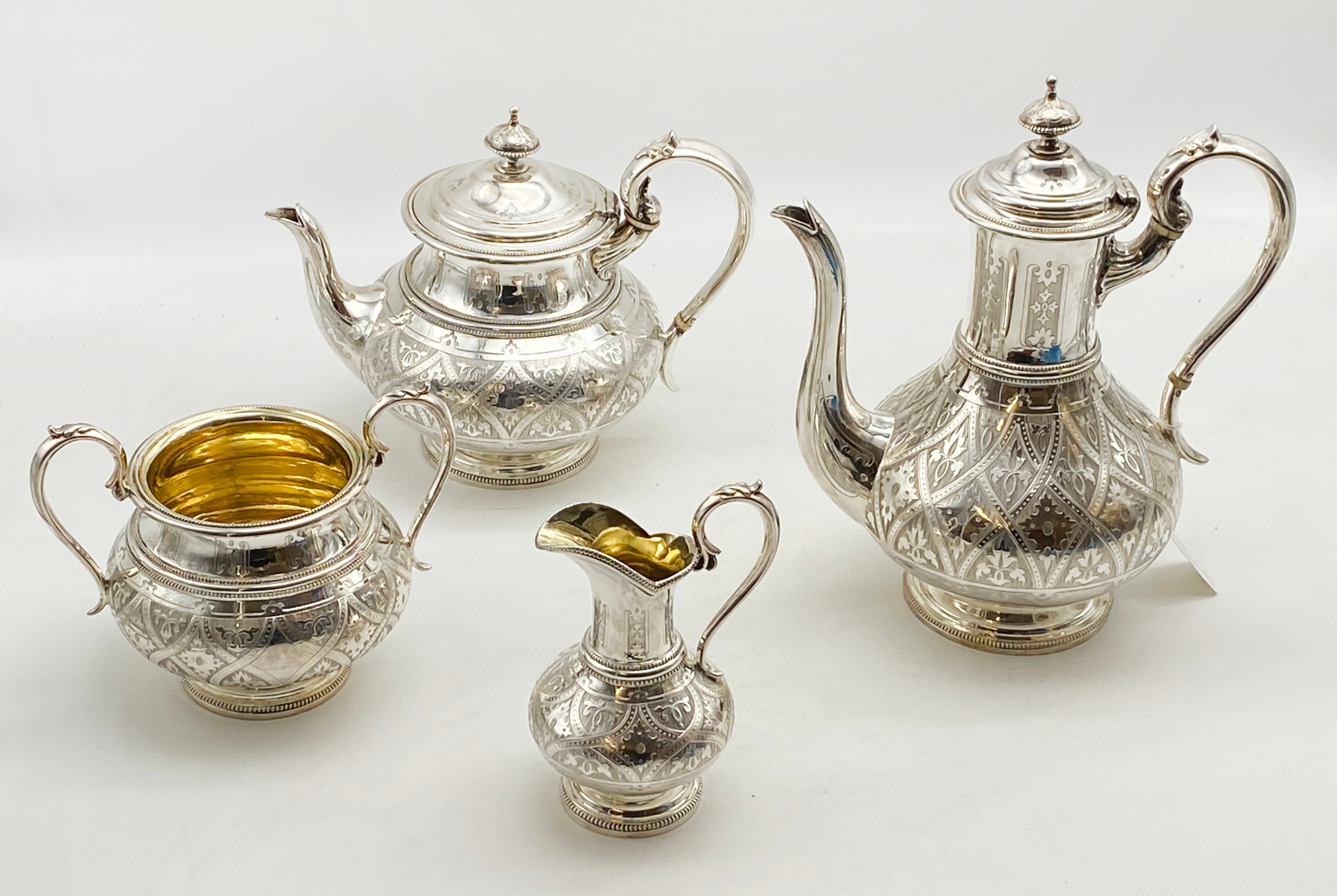 MID-VICTORIAN FOUR-PIECE HALLMARKED SILVER TEA SET