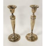 PAIR OF TALL SILVER CANDLESTICKS