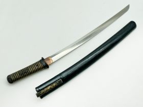 JAPANESE FAMILY MADE SWORD WITH A SMALL KNIFE TO THE FORE THAT HAS A DRAGON MOTIF & SIGNED ON THE