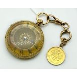 18CT GOLD CASED HENRY BUCKLAND SMALL POCKET WATCH WITH A 9CT GOLD CHAIN