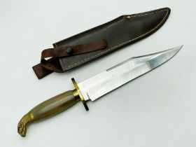 J.E MIDDLETON & SONS SHEFFIELD HUNTING KNIFE WITH BRASS GUARD, LEATHER SHEATH & EAGLE AT THE TOP