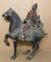 A LARGE CARVED MODEL OF A HORSE AND RIDER ON A HUNTING EXPEDITION & A CHEETAH SITS ASTRIDE THE HORSE