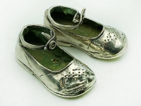 PAIR OF ANTIQUE SILVER / WHITE METAL BABY SHOES