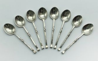 GROUP OF EIGHT ARTS END CRAFTS SILVER COFFEE SPOONS BY OMAR RAMSDEN (1873-1939)