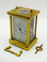 PHEATON BRASS CASED CARRIAGE CLOCK - 18 CMS (H) APPROX
