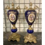 PAIR OF DARK BLUE PORCELAIN URNS