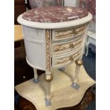 MARBLE TOP OVAL CREAM & GILT CABINET