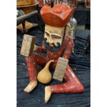 CARVED & PAINTED SEATED INDIAN FIGURE A/F 40CMS (H) APPROX